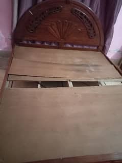 Wooden double bed