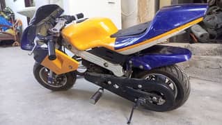 kid 25cc 2 stroke sport bike. like new, engine tyre all okay