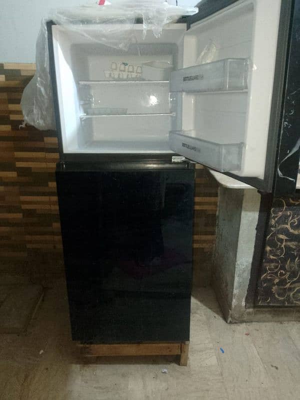 Haier Fridge Slightly use Medium size glass door 1