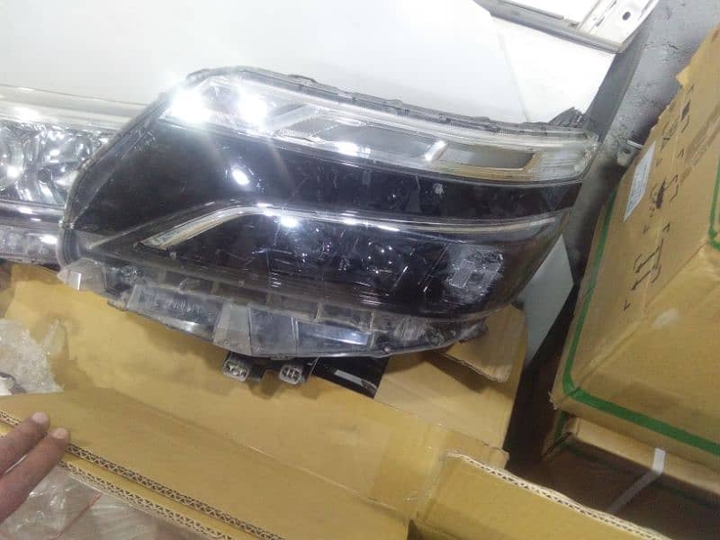 Toyota Voxy 2016 headlights and left backlight available 1