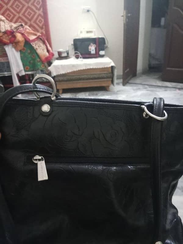 black color bag. 2