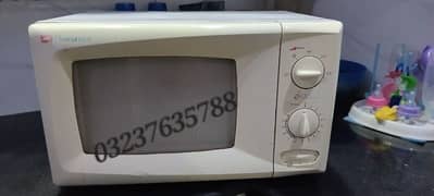 Dawlance microwave excellent  working urgently sale