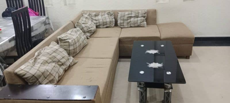 L shape sofa with table and cushions  for urgent sale 2