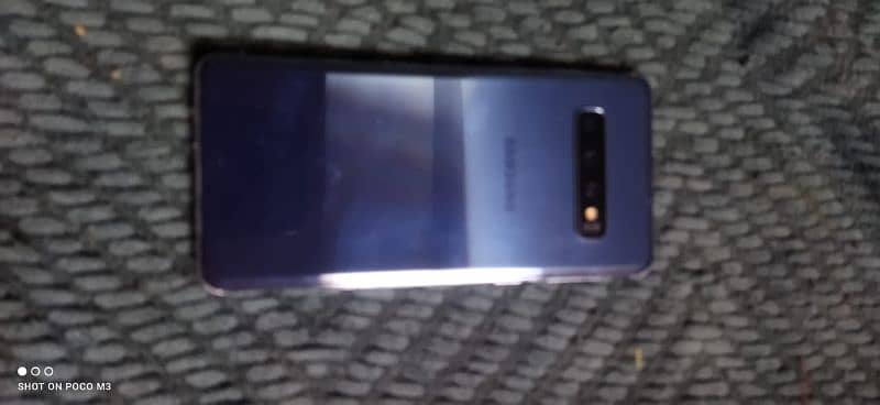 Galaxy S10 computer apprived 8/128 2 dots glass crack can see in pucs 1