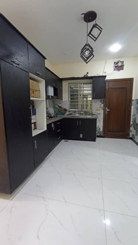 Size 50x90 New Triple Story Full House For Rent In G-13 Main double Road 2