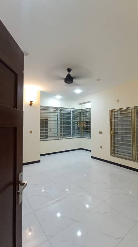 Size 50x90 New Triple Story Full House For Rent In G-13 Main double Road 11