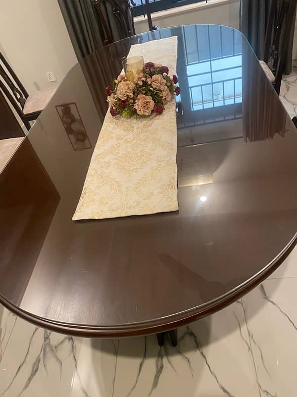 8 chairs dining table  without  chairs very good  wood and  polished 1