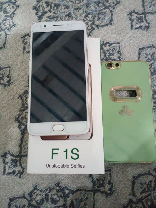 oppo F1S  single handed used 3