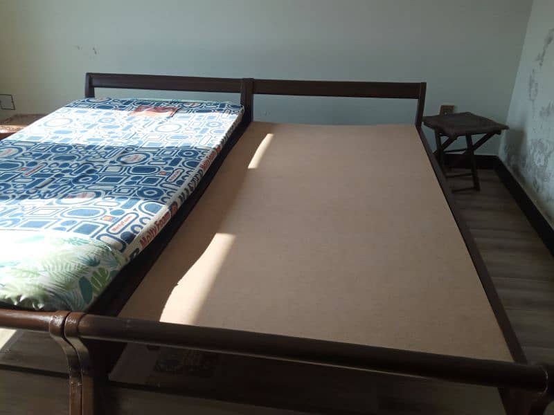 two single beds with mattress 1