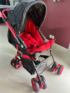 Red and black felcraft baby pram!