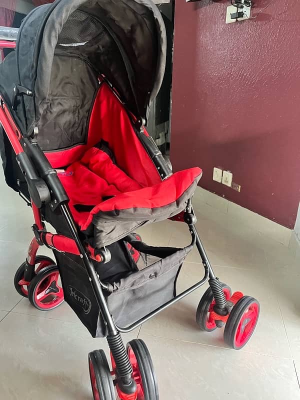 Red and black felcraft baby pram! 2