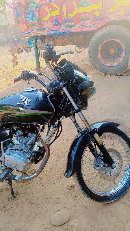 honda deluxe 125 pindi number 18/model 3