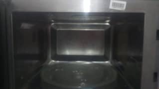 dawlance microwave oven 10 by 10 condition