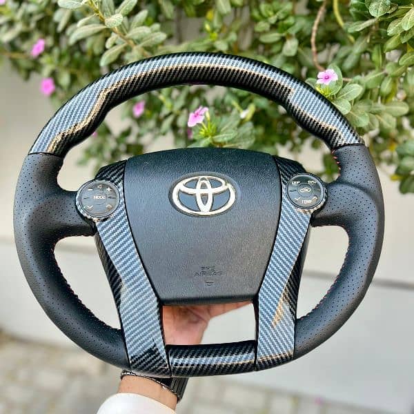 Toyota Prius + Aqua carbon fiber steering available 1