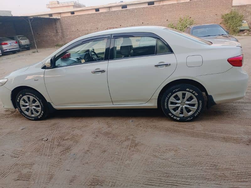 Toyota Corolla XLI 2013 99% jenion 2