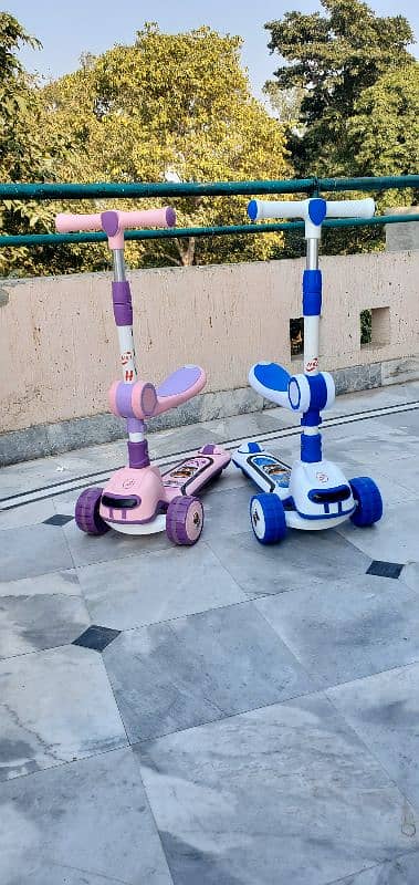 scooty for kids with LED lights and music 1