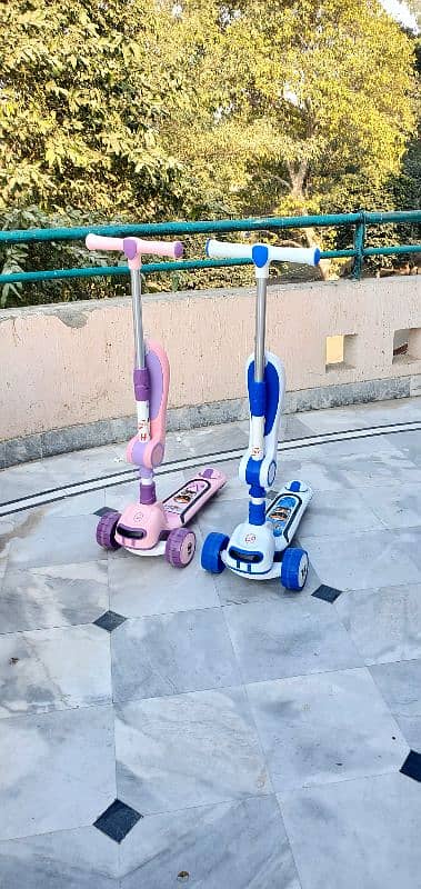 scooty for kids with LED lights and music 2