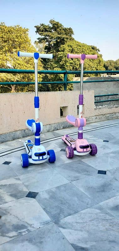 scooty for kids with LED lights and music 3