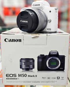 canon EOS m50 II 4k camera  two batteries charger lens and canon strap