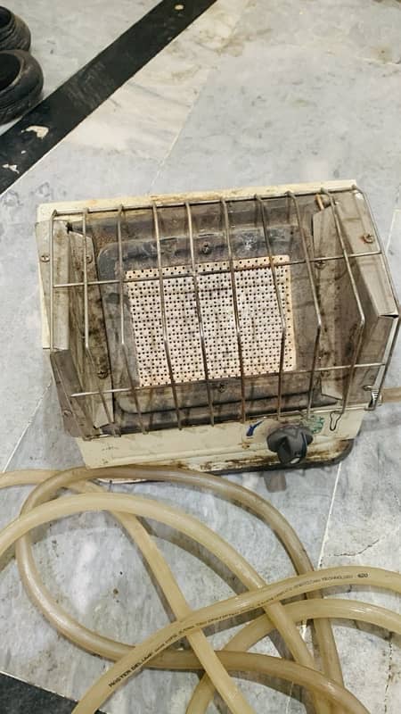 Gas Heater with 5-7 Feet  Gas Pipe in Good Condition 1