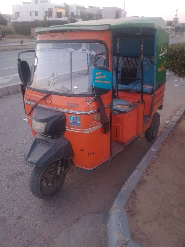 orange colour riksha genuine condition. 0