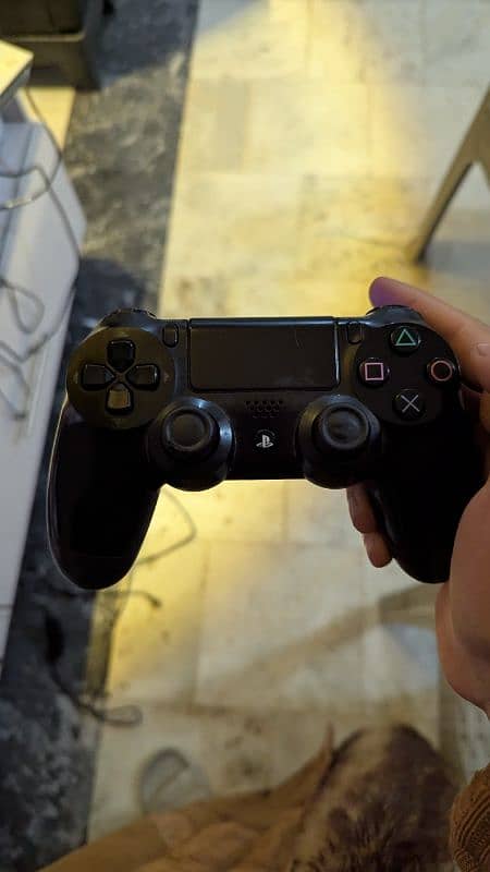 PS4 with two controllers 9