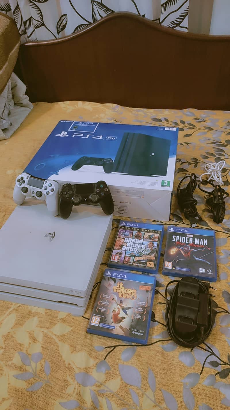 PS4 Pro 1TB - White Edition with Bonus Games & Accessories! 0