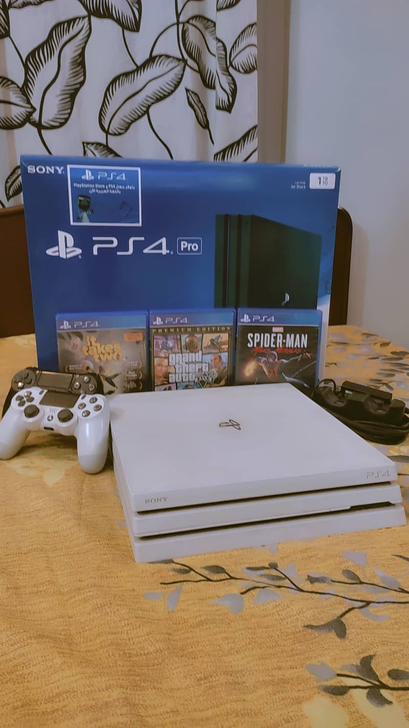 PS4 Pro 1TB - White Edition with Bonus Games & Accessories! 1