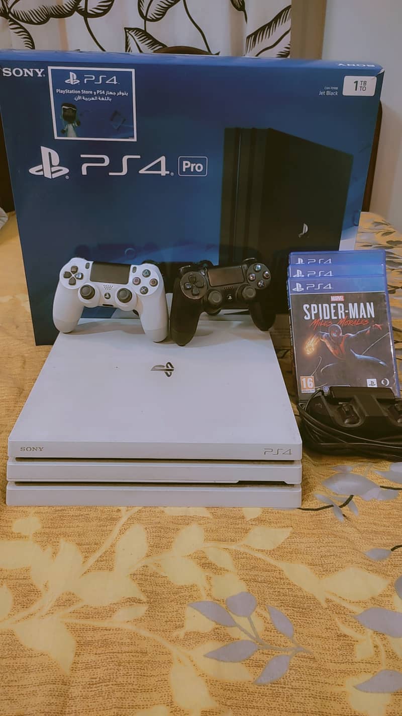 PS4 Pro 1TB - White Edition with Bonus Games & Accessories! 4