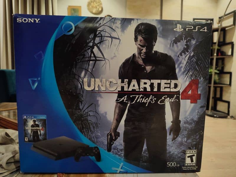 PS4 Slim (500GB) with 2 controllers and 7 Games 0