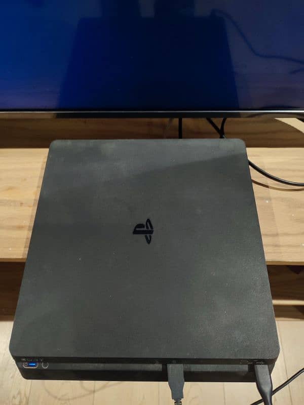 PS4 Slim (500GB) with 2 controllers and 7 Games 3