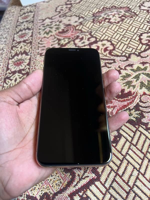 iPhone XS 10 x 9.5 256gb battery health 89 all okay 0