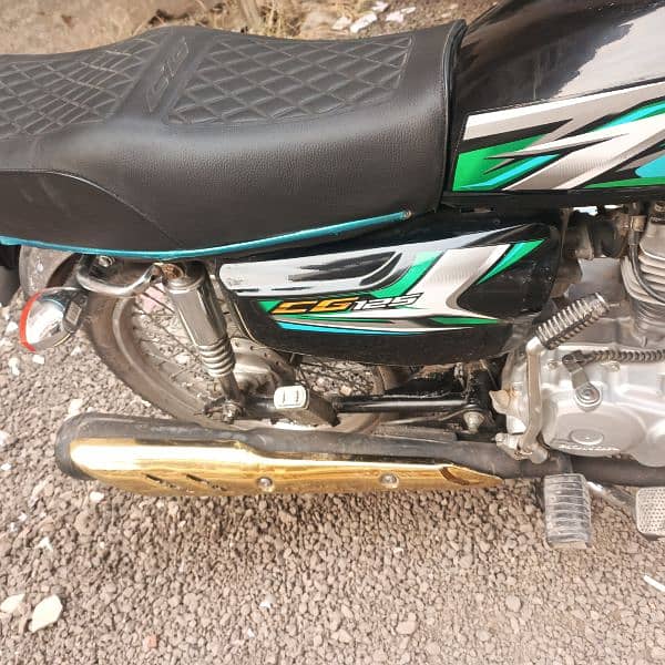 Honda 125 red colour 21 model urgent for sale 8