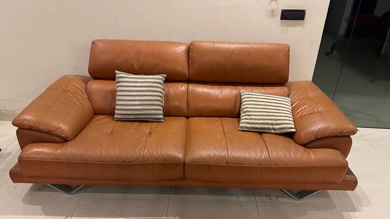 imported , pure leather sofa from China . Two , 3 seatets 1