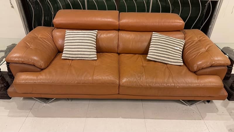 imported , pure leather sofa from China . Two , 3 seatets 2