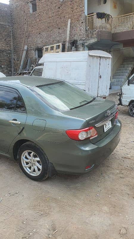 Toyota Corolla GLI 2012  contact no 03048979363 0