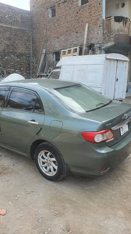 Toyota Corolla GLI 2012  contact no 03048979363 1