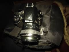 Nikon d3100 with 50mm f 1.8 youngu lens wit. 2 batteries