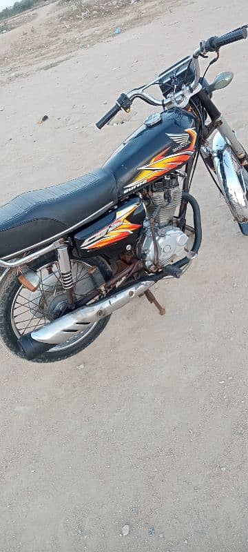 Honda 125 Karachi number first owner 0312/24/92/688 4