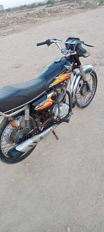 Honda 125 Karachi number first owner 0312/24/92/688 10