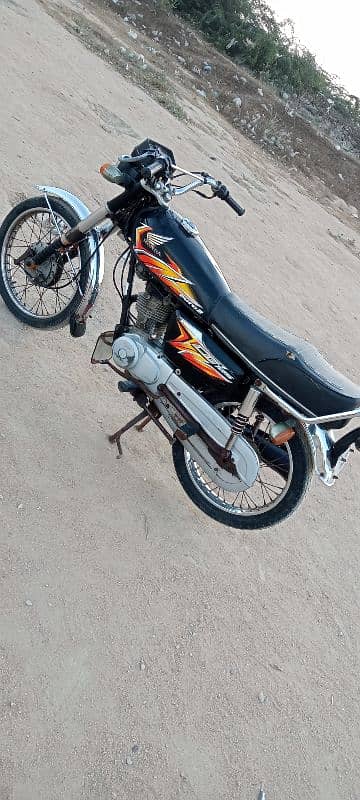 Honda 125 Karachi number first owner 0312/24/92/688 15