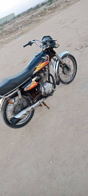 Honda 125 Karachi number first owner 0312/24/92/688 16