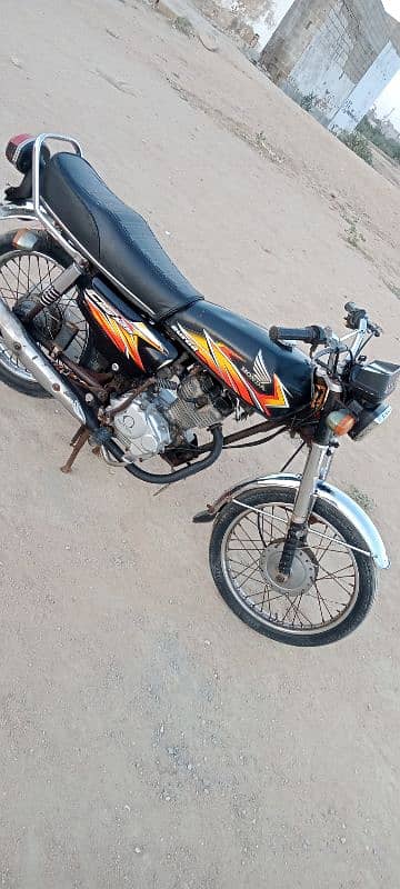 Honda 125 Karachi number first owner 0333/85/72/395 9