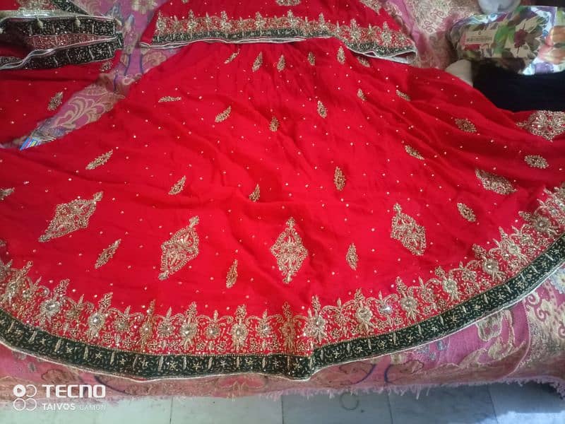 beautiful red lehnga for bridal same like new with box packing 0