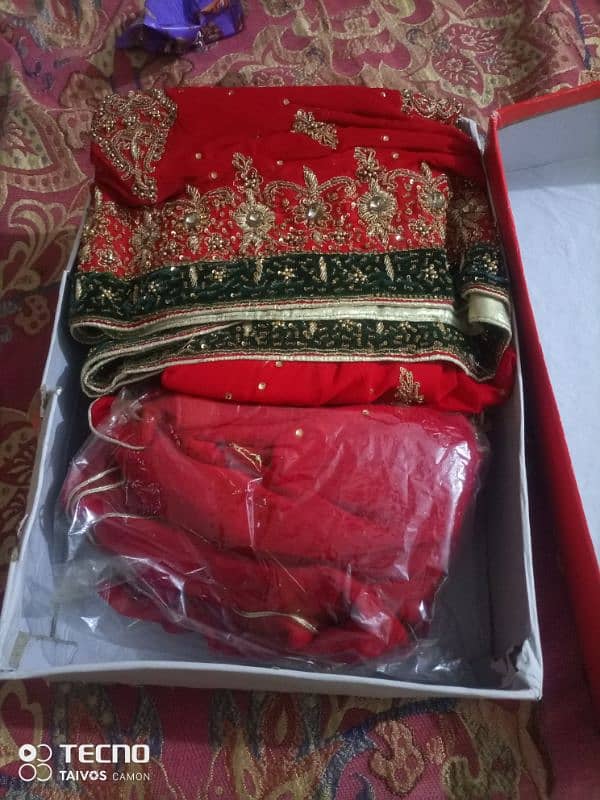 beautiful red lehnga for bridal same like new with box packing 5