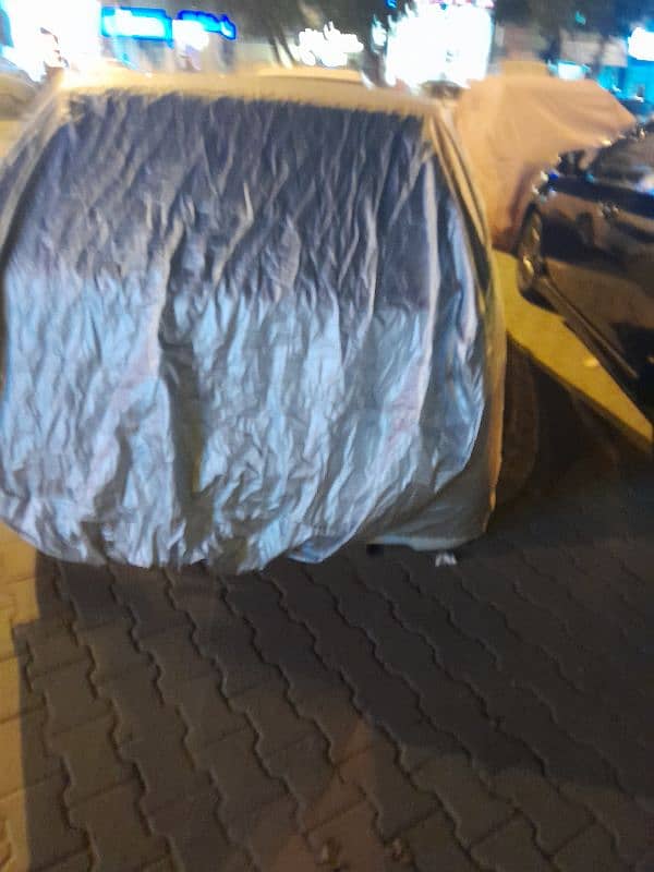 hatch back car cover just 15 days used . waterprof best perashot fabric 1