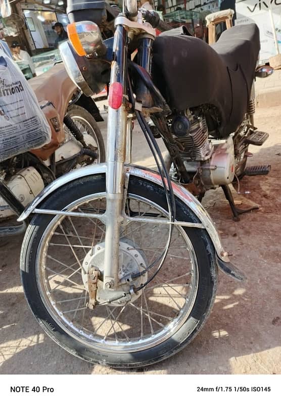 honda 125 all ok ha condition punjab namber 4