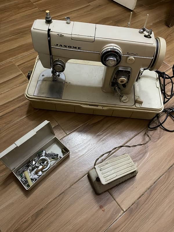 Janome sewing machine with embroidery utensils 0