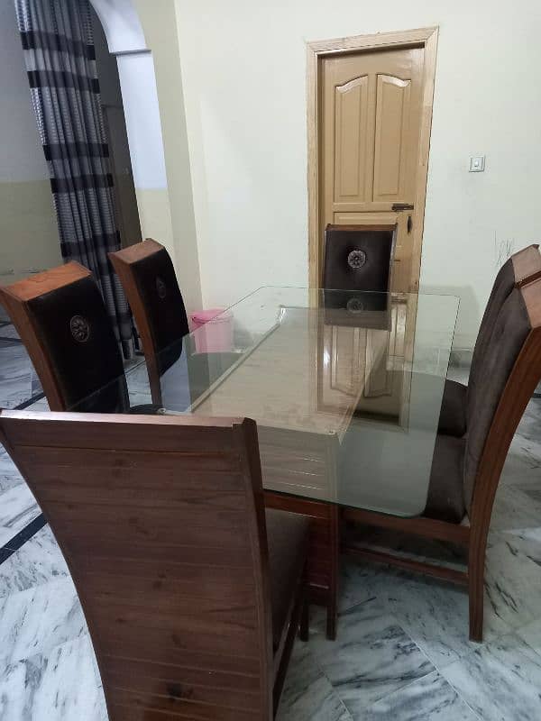 Good condition dinning table 14