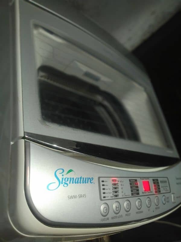 Signature 11kg Fully Automatic Top Loading Washing Machine 0